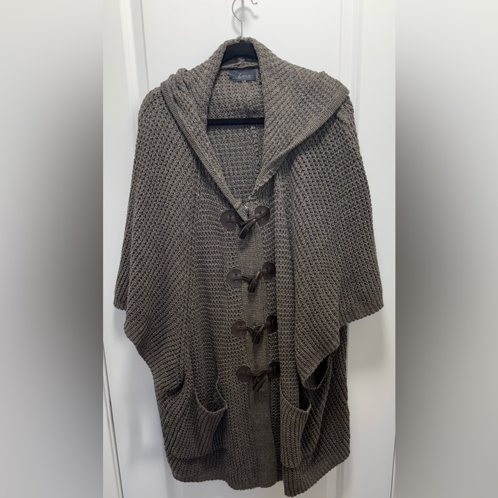LINE light brown button up sweater with pockets. One Size (m-xl)(Brand New)